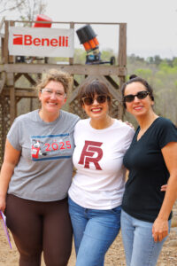 3 Women smiling on Etowah Valley Sporting Clays blue course in Dawsonville, GA.